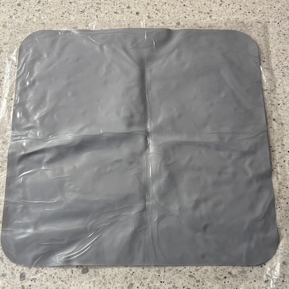 Gray Pet Feeding Mat with Paw Prints, Brand New
